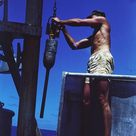 Dill #15 [Man in bucket on R/V HORIZON with Phleager coring device]
