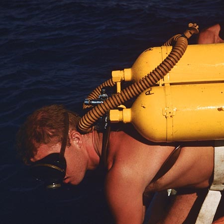Phil Jackson in scuba gear over Alexa Bank
